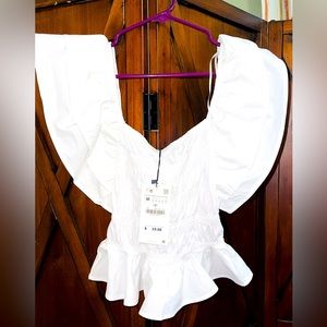 Brand new white ruffle sleeve top!